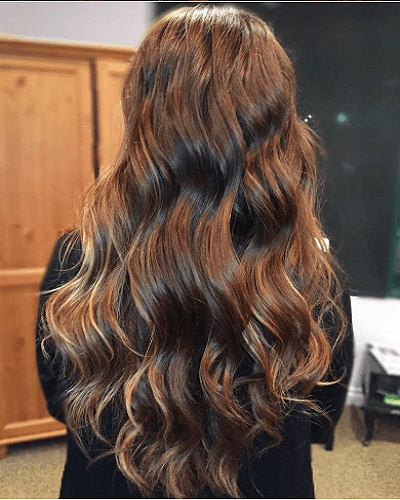 Dark brown hair extensions with invisible natural blend
