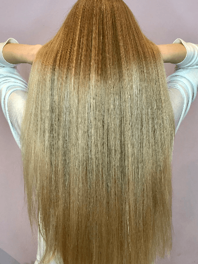 Genius weft human hair extensions creating seamless fullness and natural volume