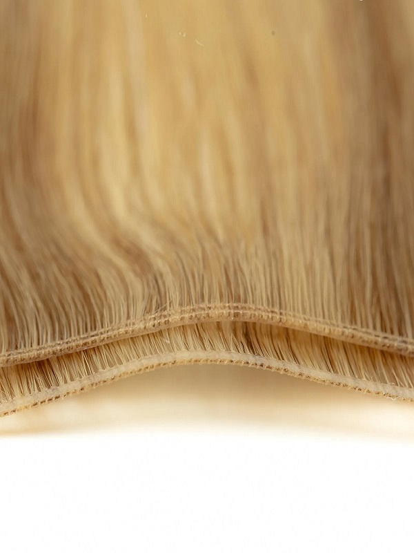 Genius weft human hair extensions showing ultra-thin weft structure and density