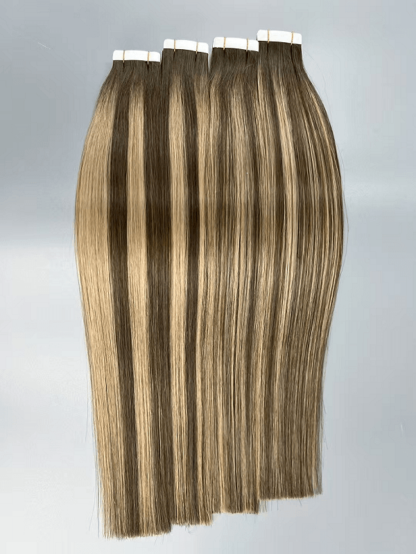 Tape-in human hair extensions showing flat weft design and natural color match