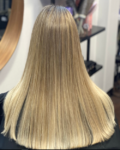 Seamless balayage hair extensions blended in salon