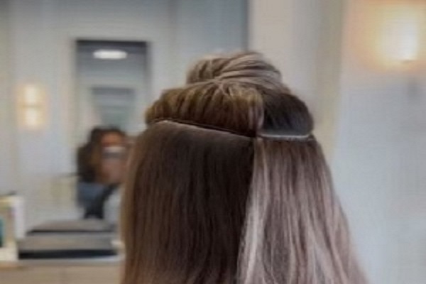Seamless human hair extensions blending naturally with real hair